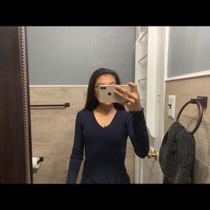 Nautical V-neck sweater.